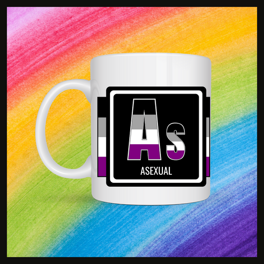 White mug with a 3 inch square containing the element’s symbol (As) and name (Asexual). Symbol is made with the colors of that element’s flag in a black square with the element’s flag behind the square. Behind the mug is a rainbow background.