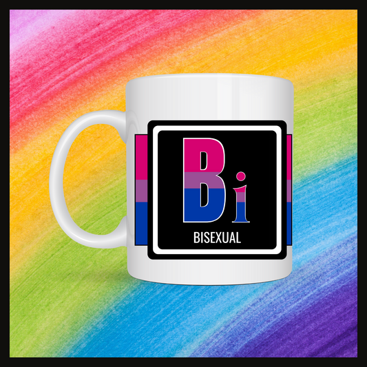 White mug with a 3 inch square containing the element’s symbol (Bi) and name (Bisexual). Symbol is made with the colors of that element’s flag in a black square with the element’s flag behind the square. Behind the mug is a rainbow background.