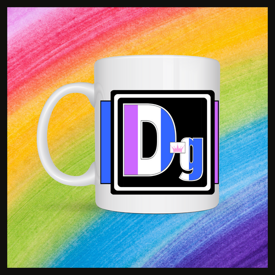 White mug with a 3 inch square containing the element’s symbol (Dg). Symbol is made with the colors of that element’s flag on a black background. Behind the mug is a rainbow background.